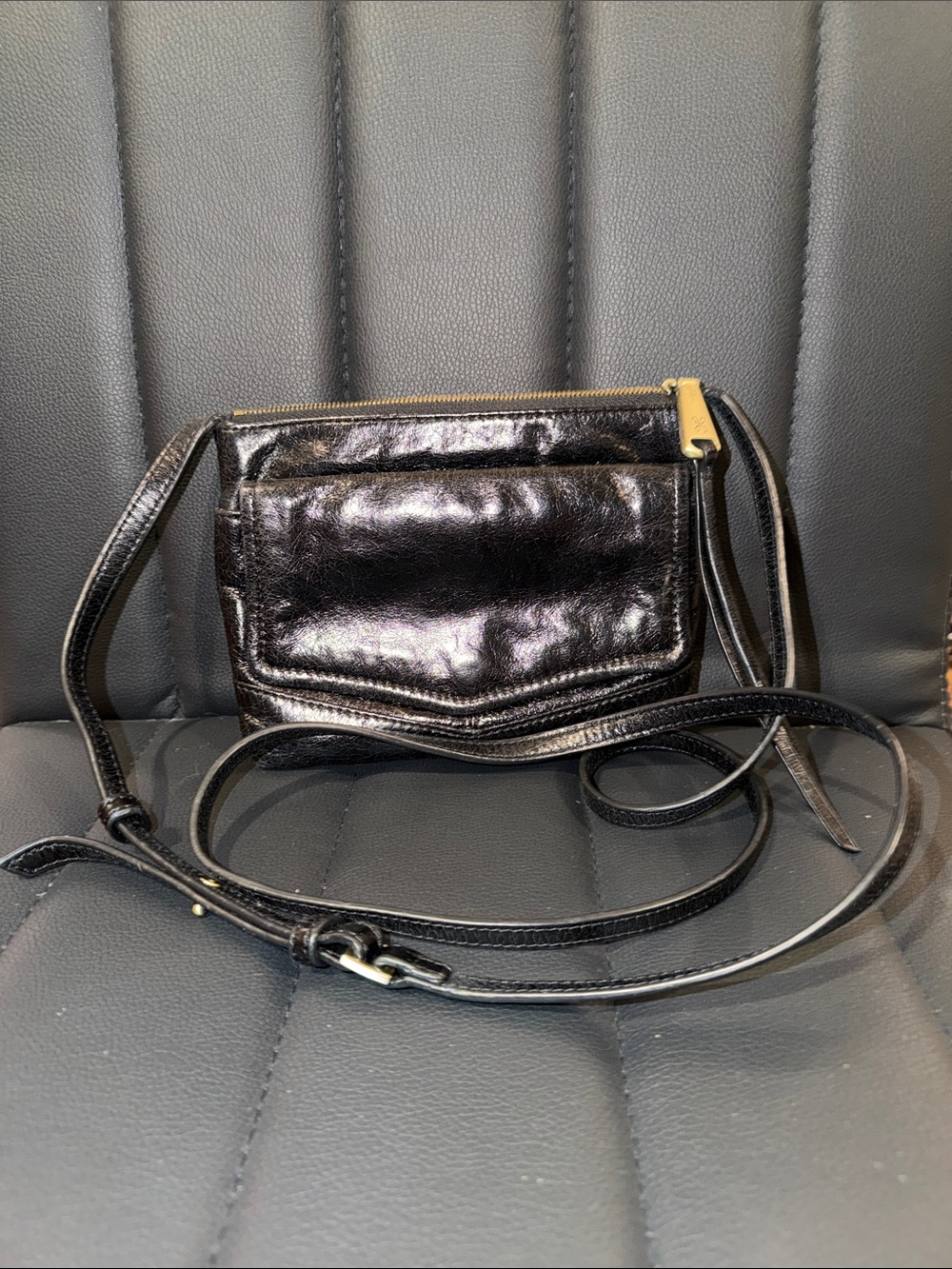 HOBO Black Leather Crossbody with Gold-Tone Zip Accent